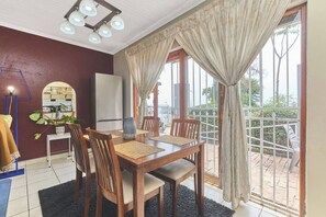 Apartment, 2 Bedrooms, Patio | Dining room - Cozy Two Bedroom Escape (Johannesburg)
