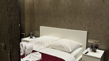 Deluxe Suite, City View | Premium bedding, desk, laptop workspace, soundproofing