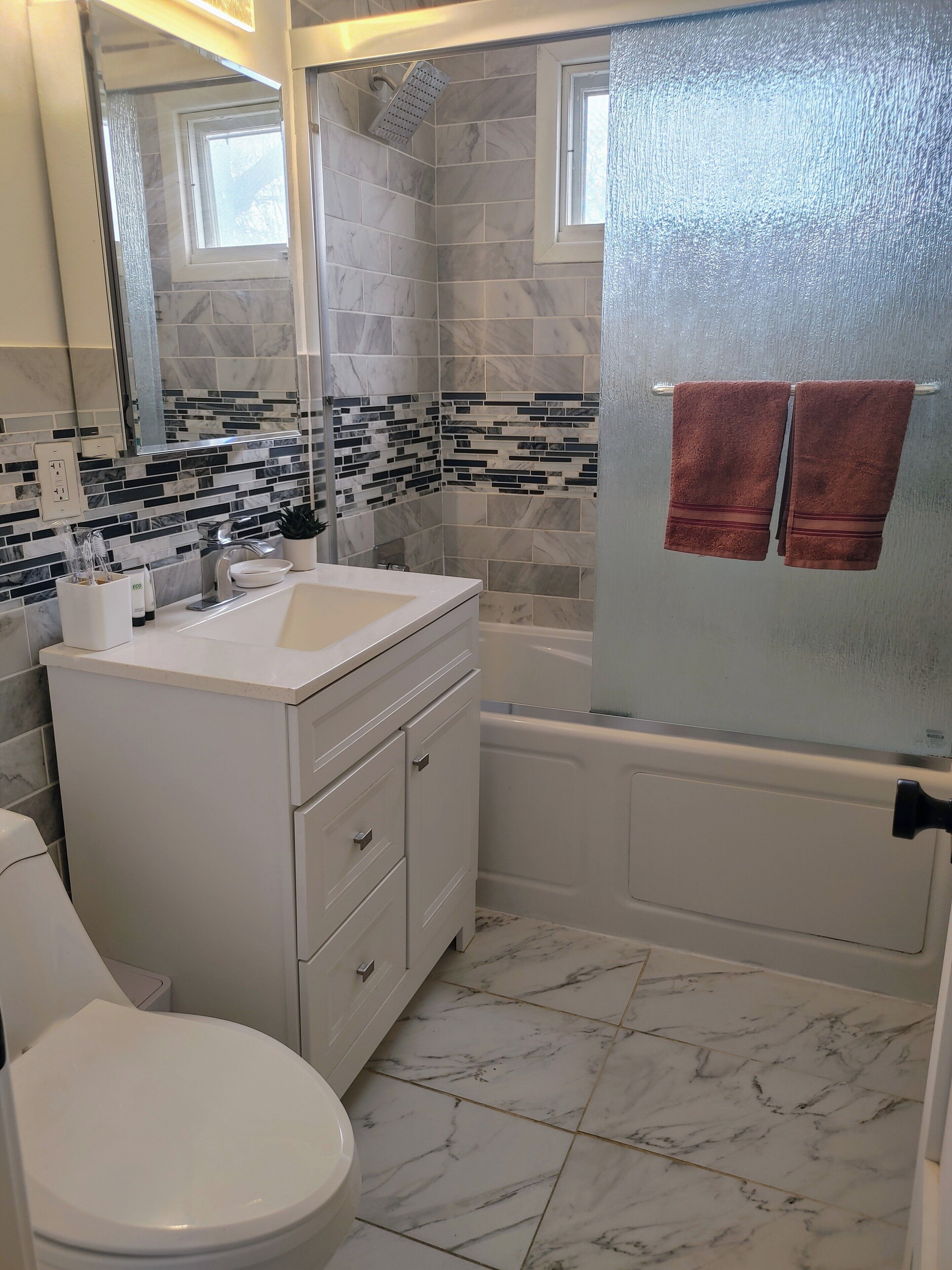 Hair dryer, towels, soap, toilet paper