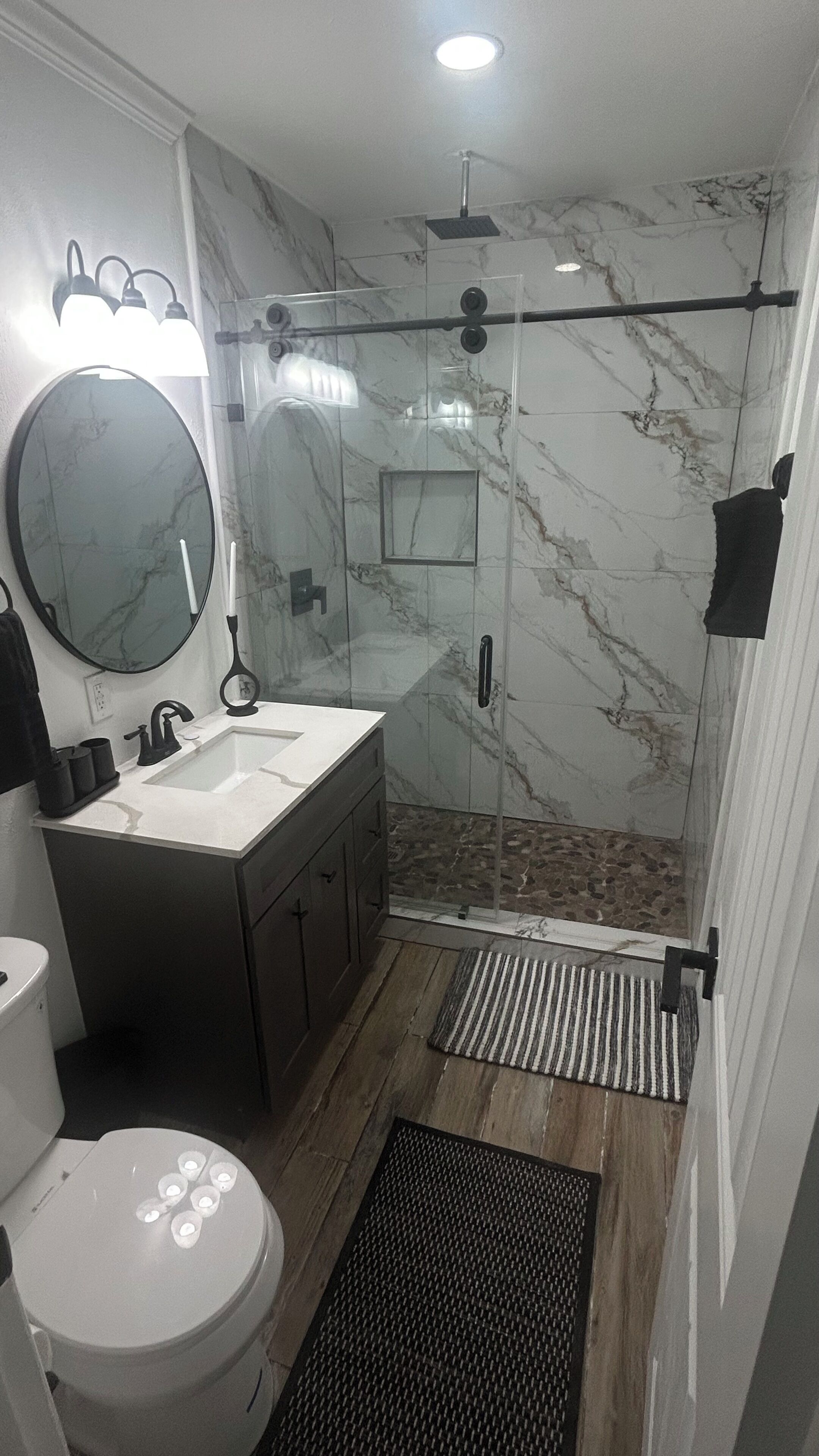 Shower, towels, toilet paper
