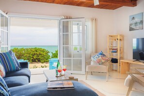 Living area - Caicos Calm: Serene 2BR Condo in Whitby, North Caicos - a Garden Isle Getaway (Whitby)