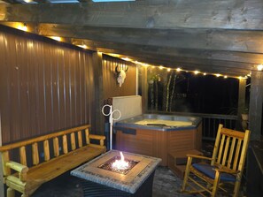Outdoor spa tub - Peaceful 2-bedroom cabin with AC in charming Irons, hot tub, sauna, covered deck (Irons)