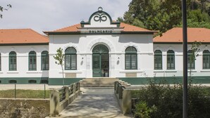 A building with a sign reading 'BALNEARIO' and a central entrance with a staircase. - Portas de Melgaço Apartment | Minho | The northernmost town in Portugal (Melgaço)