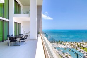 Outdoor dining - Charming 2-bedroom condo on the white sandy beaches of Mexico (Cabo San Lucas)