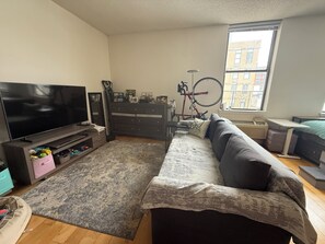 Living area -     Modern Grove St Studio: Pool + PATH + World Cup (Jersey City)
