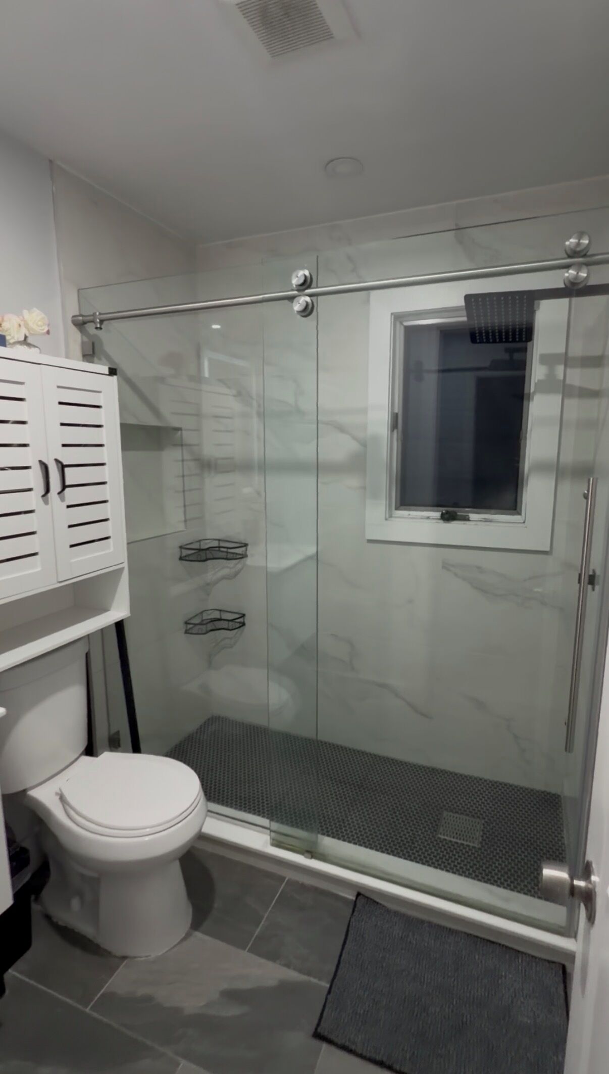Shower, towels, soap, toilet paper
