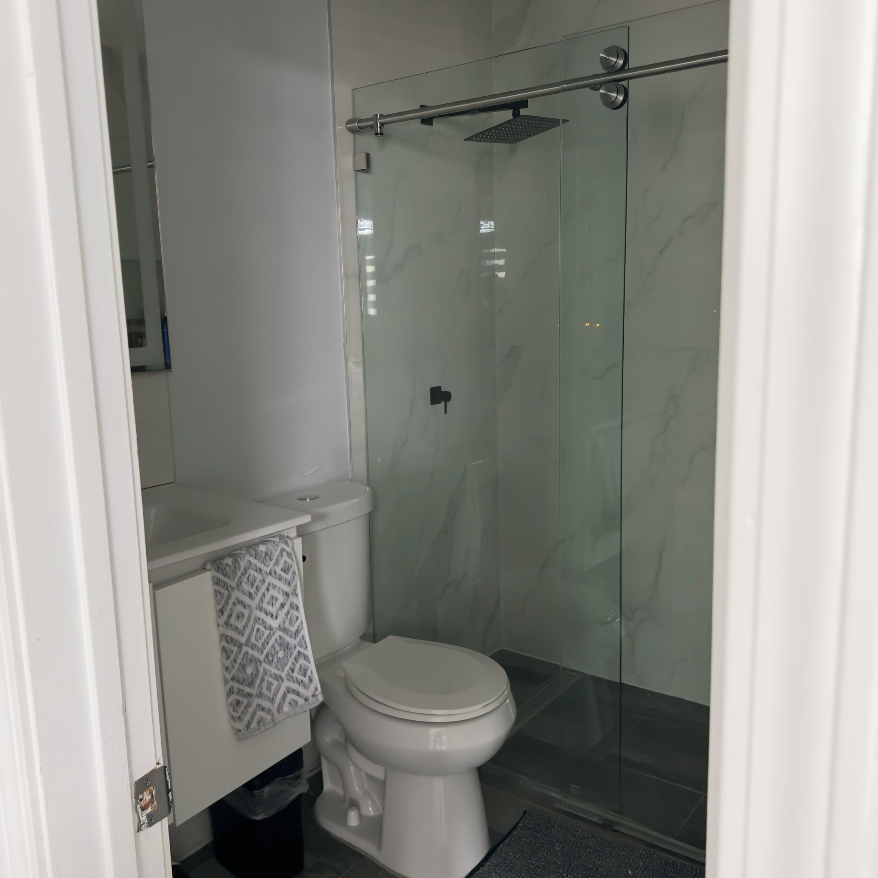 Shower, towels, soap, toilet paper