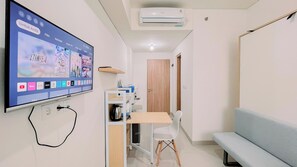 Standard Studio | Television - Warm And Comfy Studio Apartment (No Kitchen) Bandaraya - Tallasa City Makassar (Makassar)