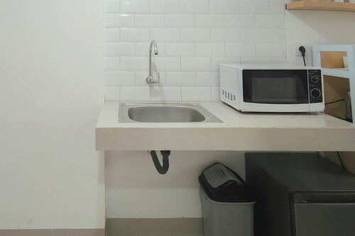 Neat And Warm Studio Room At Apartment Bandaraya - Tallasa City Makassar