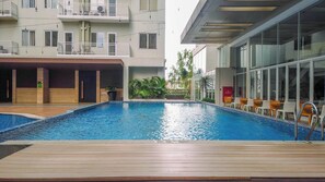 Outdoor pool - Comfortable Studio (No Kitchen) At Bogor Icon Apartment (Bogor)