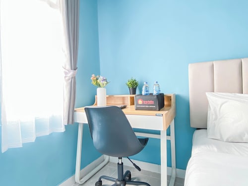 Neat Studio With Blue Toned Wall At Dramaga Tower Apartment