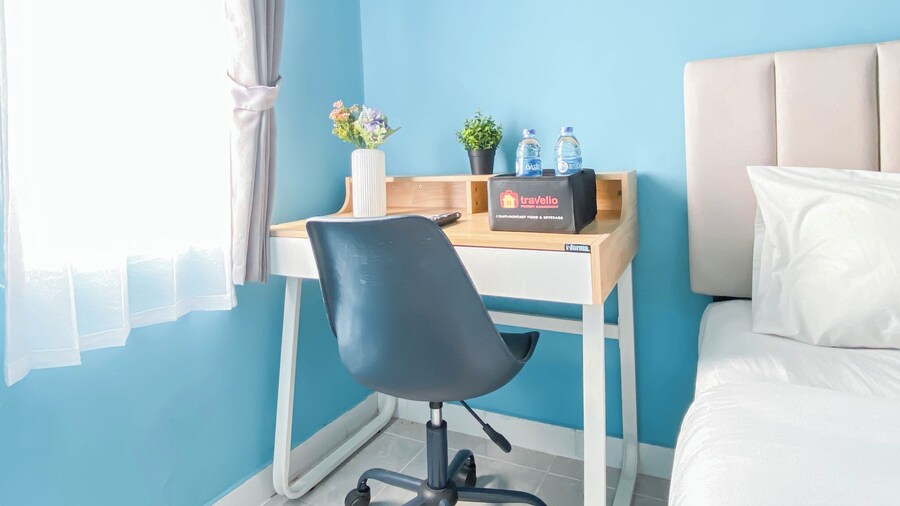 Neat Studio With Blue Toned Wall At Dramaga Tower Apartment