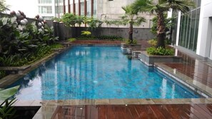Outdoor pool - Gorgeous And Cozy 2Br Apartment Kemang Village (Jakarta)