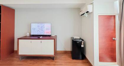 Classic Wooden Touch Studio Room At Apartment Mataram City