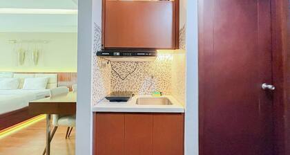 Classic Wooden Touch Studio Room At Apartment Mataram City