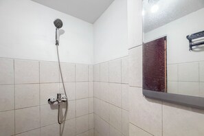 Standard Studio | Bathroom - Comfortable And Practical Studio Room At Suncity Residence Apartment (Sidoarjo)