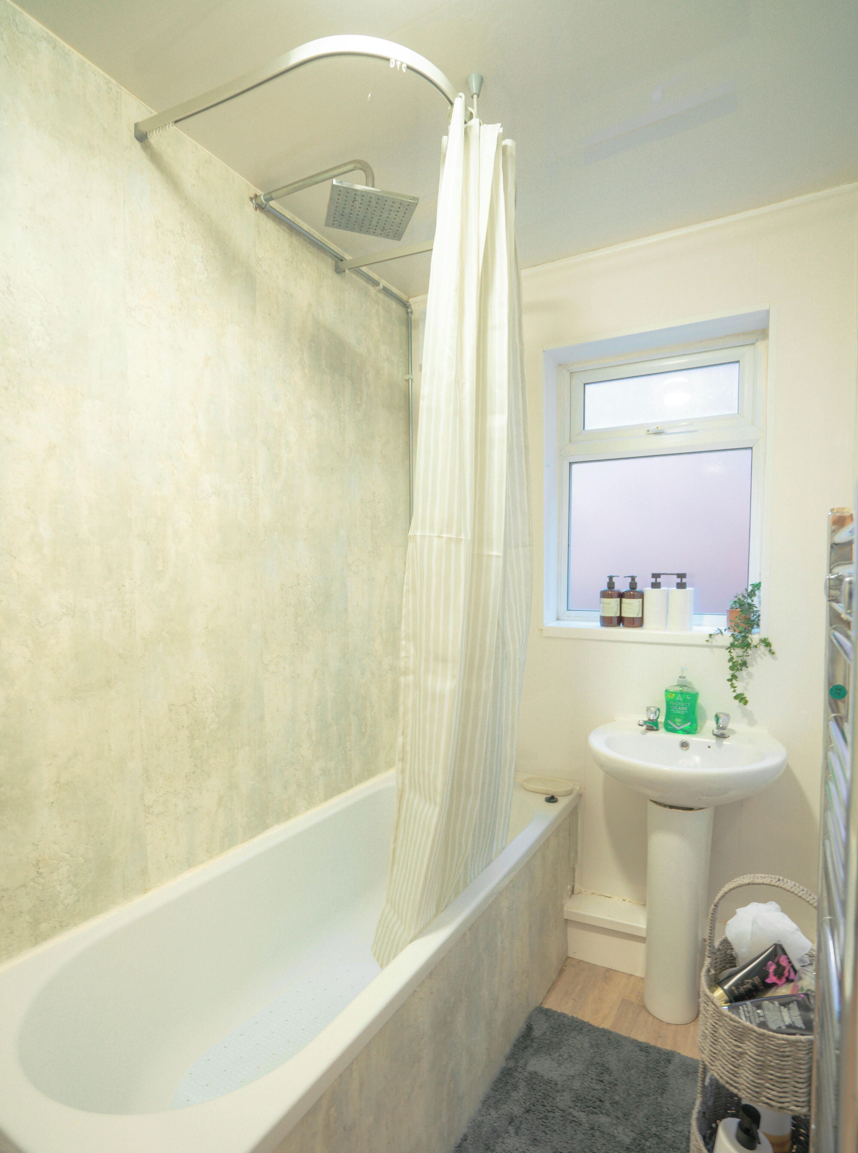 Shower, towels, soap, toilet paper