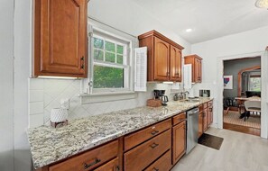 Fridge, microwave, oven, stovetop - Charming 3-bedroom bungalow, College Hill/downtown Wichita-adjacent w/ amenities (Wichita)