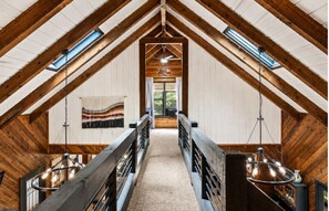 Skylit loft walkway above the great room connects the upstairs bedrooms. - Blue Ridge Cabin Sleeps 12: Games, Views, Hot Tub (Blue Ridge)