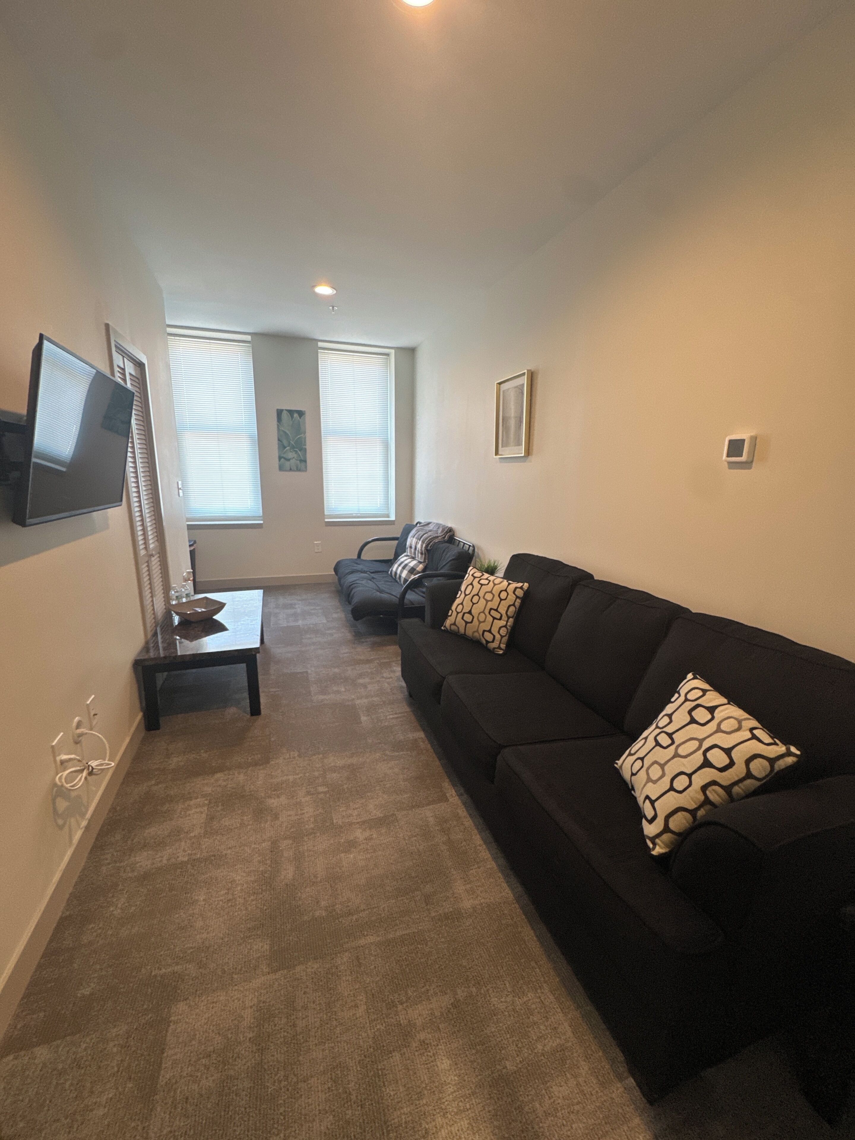 Room 201 | Área de sala de estar