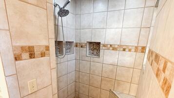 Shower, towels, soap, toilet paper
