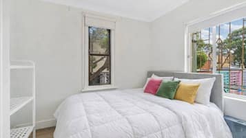 1 bedroom, desk, iron/ironing board, travel crib