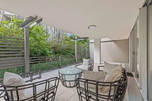 Terrace/patio - Spacious 3BR Retreat | Pool, Gym & Parking (Bowen Hills)