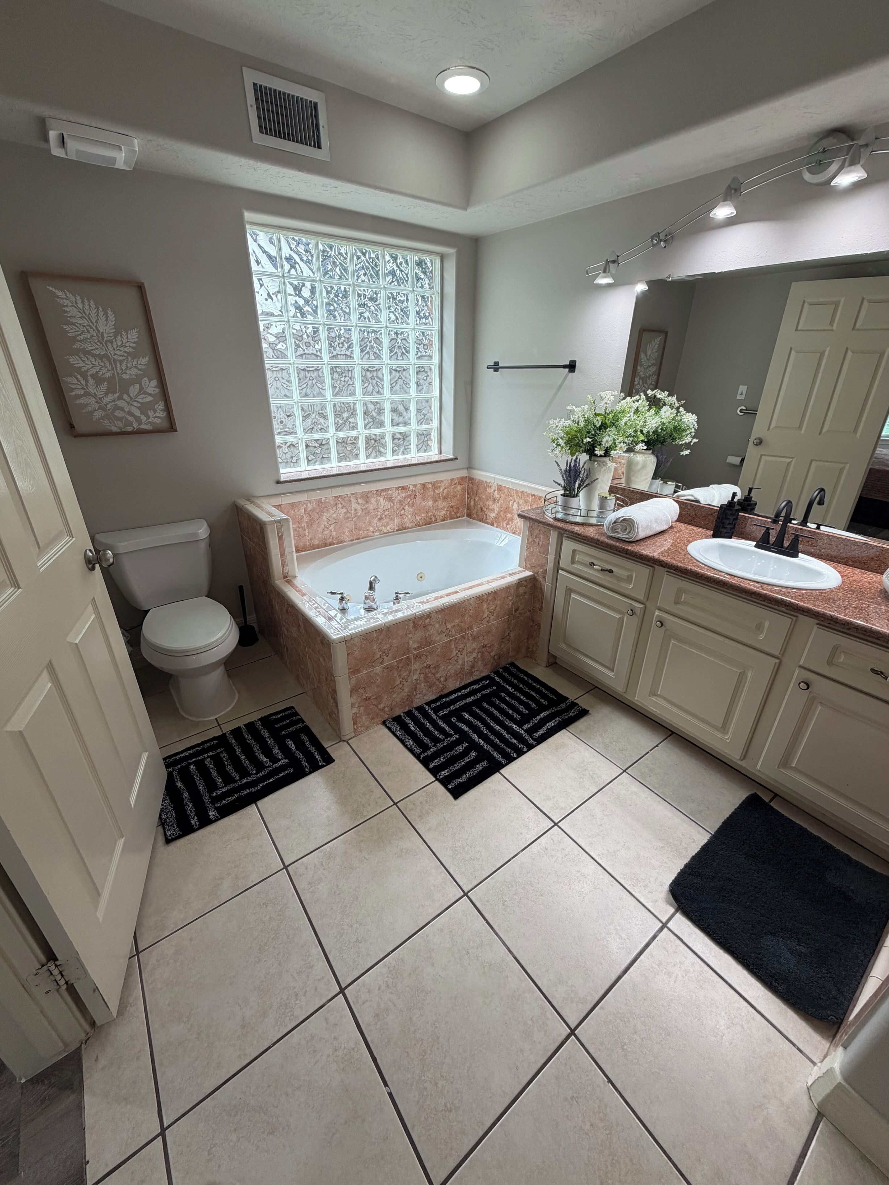 Jetted bath, eco-friendly toiletries, hair dryer, towels