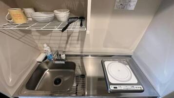 Fridge, microwave, stovetop, cookware/dishes/utensils