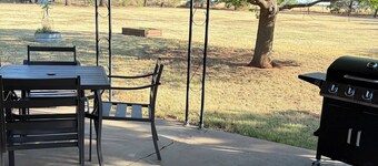  Stay at our spacious 4-bedroom 2 bathroom house in Childress with AC.