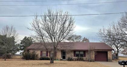 Stay at our spacious 4-bedroom 2 bathroom house in Childress with AC.