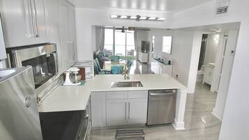 Coffee/tea maker, fridge, microwave, oven
