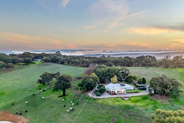Expansive countryside views across 15 private acres.