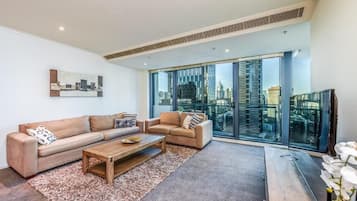 Deluxe Apartment, Balcony, City View | Living area