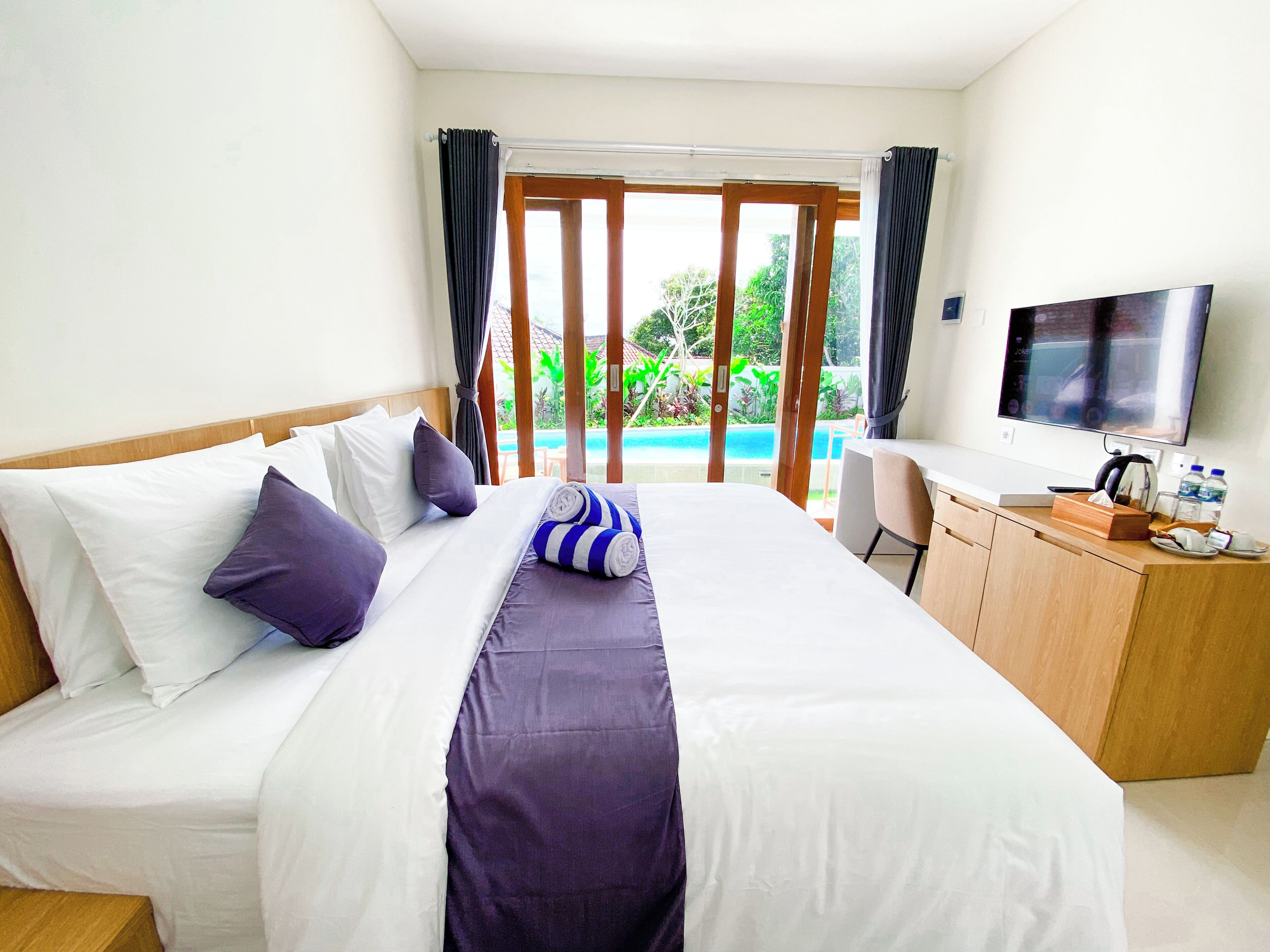 Deluxe Double Room, Pool View | Desk, laptop workspace, free WiFi