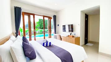 Deluxe Double Room, Pool View | Desk, laptop workspace, free WiFi