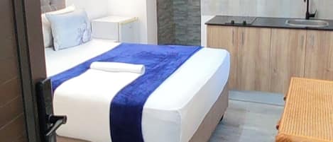 1 chambre, fer et planche Ă repasser, Wi-Fi, draps fournis