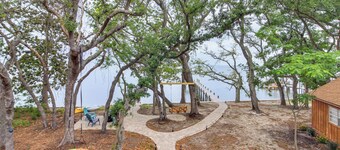 Cozy Bayfront Log Cabin! Fishing Pier, Swim Dock!