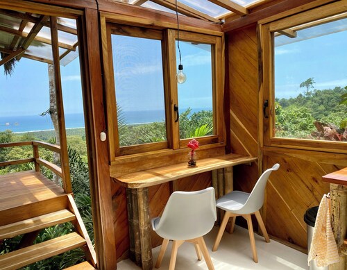 Hilltop cabin with incredible jungle and sea views