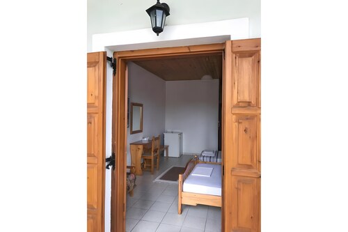 Studio Apartment 'Hotel Antigoni Triple Room 12' with Lake View, Wi-Fi and Air Conditioning