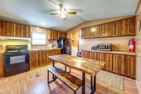 Fridge, microwave, stovetop, coffee/tea maker