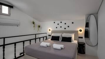 Tabla de planchar con plancha, wifi gratis y ropa de cama