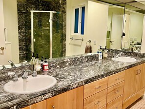 Shower, hair dryer, towels, soap