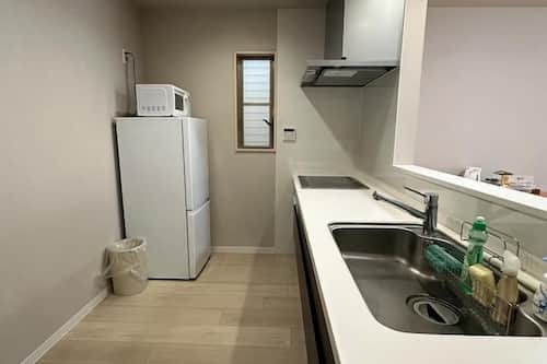 Villa, 4 Bedrooms, Balcony | Private kitchen | Fridge, microwave, stovetop, cookware/dishes/utensils