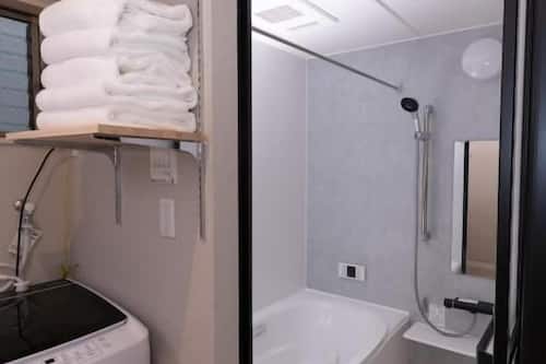 Villa, 4 Bedrooms, Balcony | Bathroom | Combined shower/bathtub, hair dryer, slippers, towels