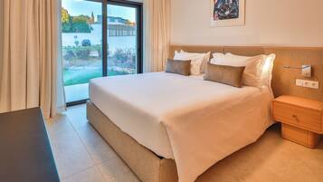 In-room safe, blackout curtains, iron/ironing board, cots/infant beds