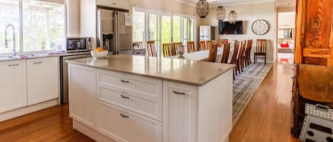 Dishwasher, coffee/tea maker, cookware/dishes/utensils