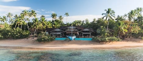 On the beach, sun loungers, beach towels