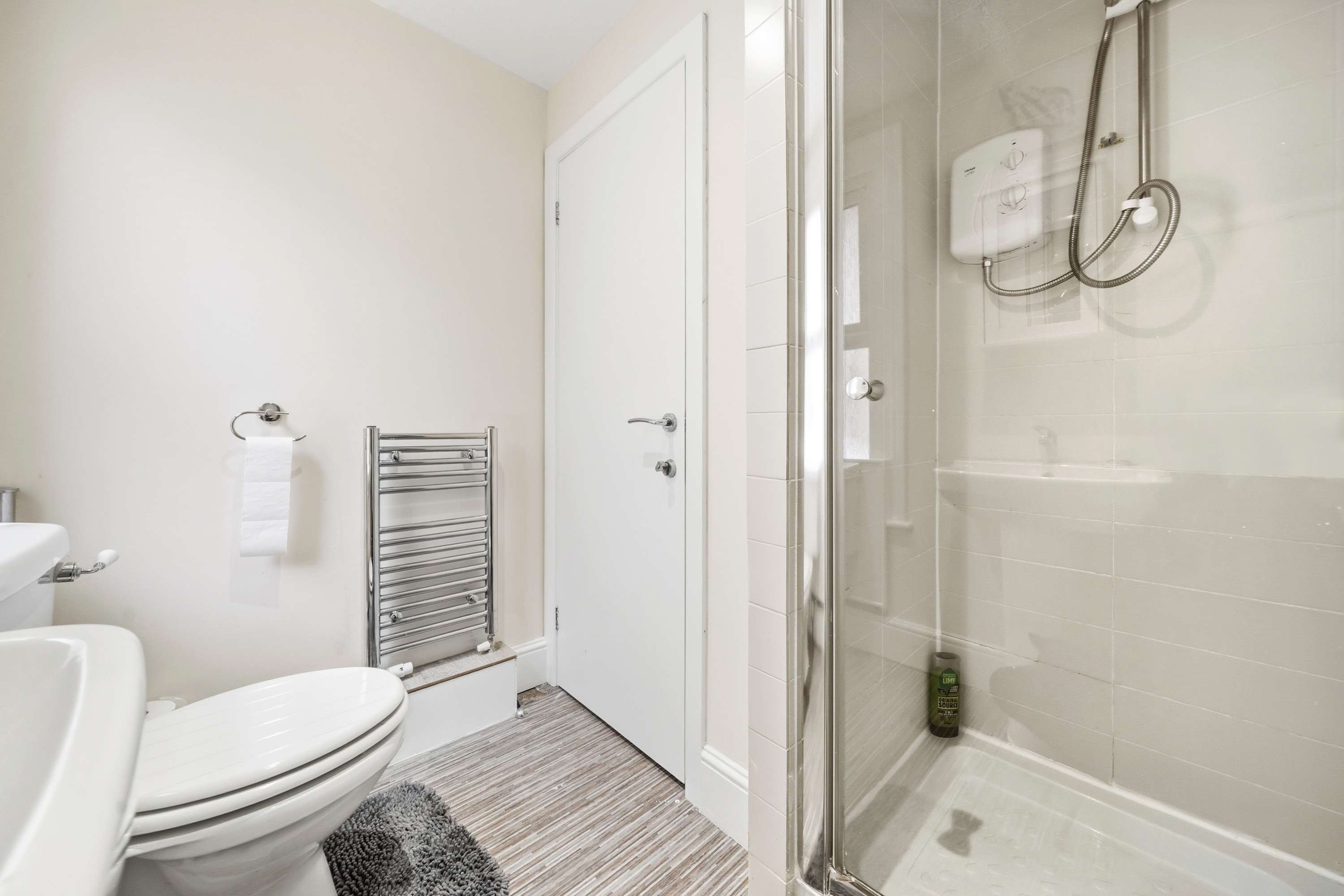 Shower, hair dryer, towels, shampoo
