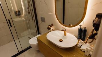 Shower, jetted bath, eco-friendly toiletries, hair dryer